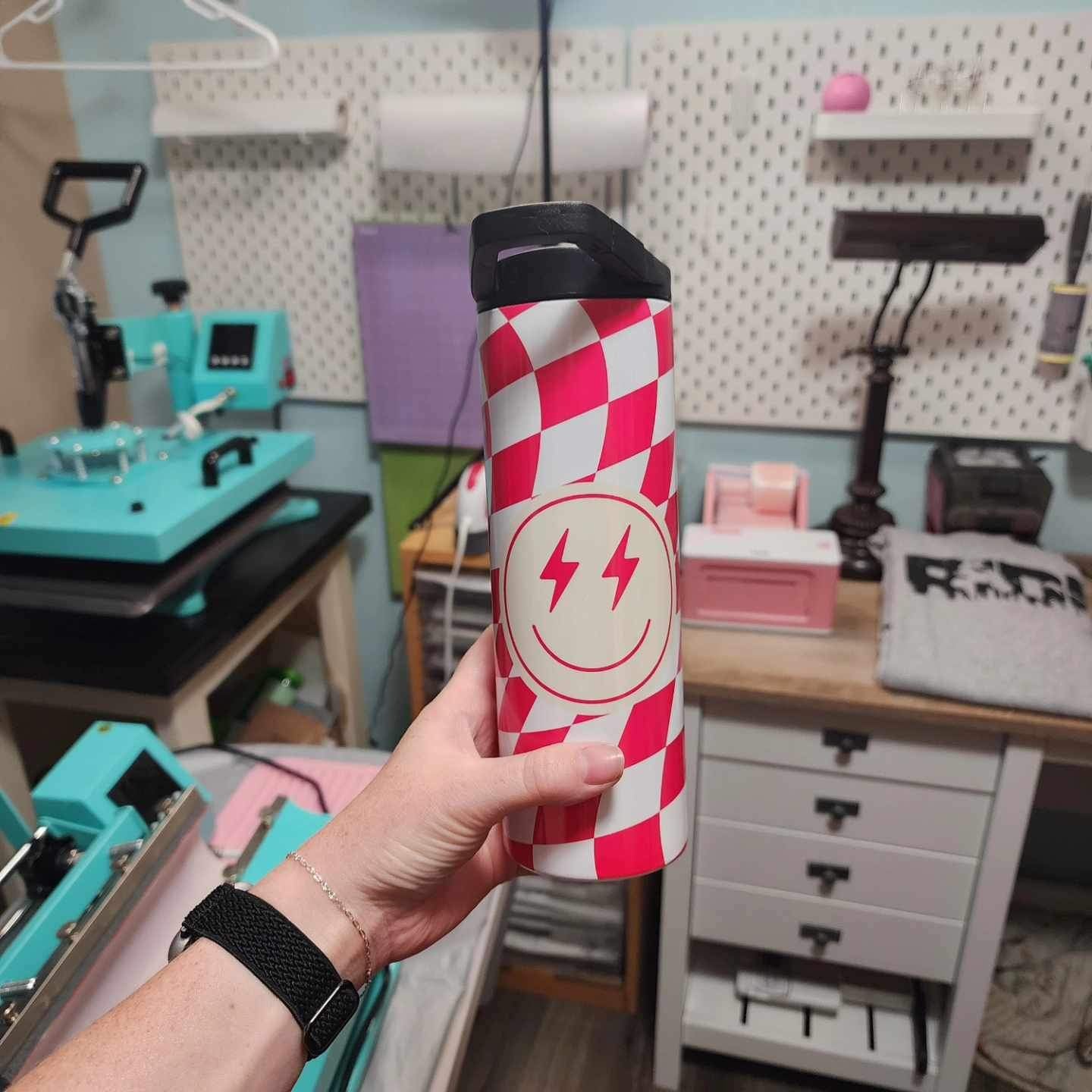 Pink checkered smiley face tumbler